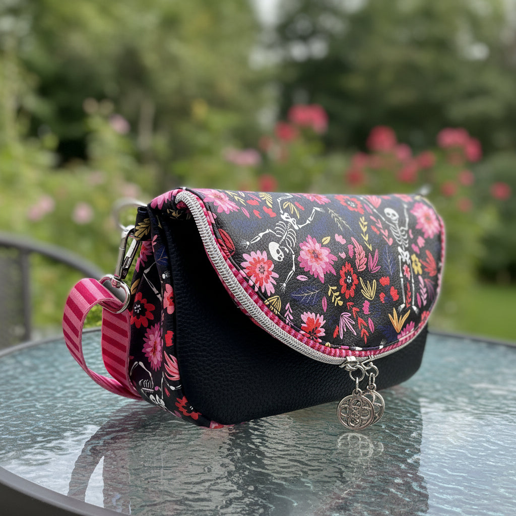 Skeleton & Floral Crossbody — Bold Print, Vinyl Exterior