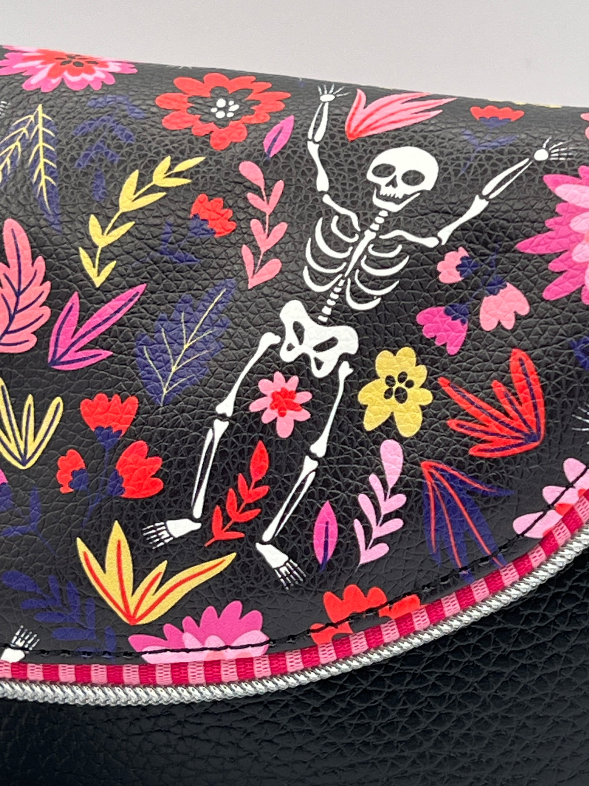 Skeleton & Floral Crossbody — Bold Print, Vinyl Exterior