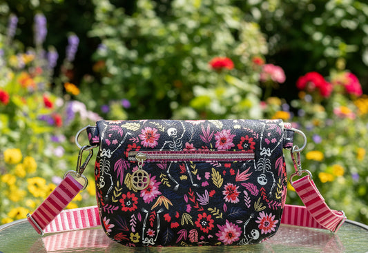 Skeleton & Floral Crossbody — Bold Print, Vinyl Exterior